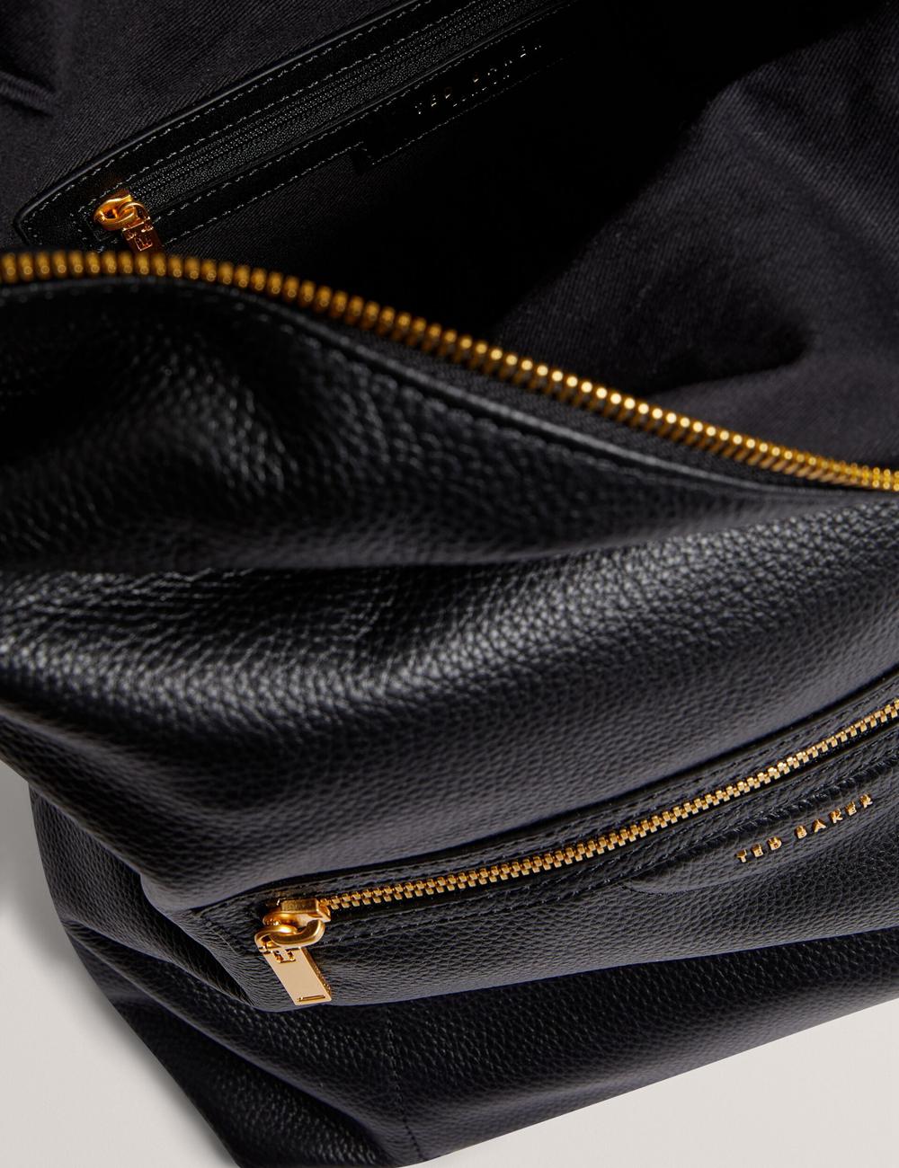 Women Ted Baker ESSAYA - Leather Webbing Strap Fold Over Backpacks Black | KSA  1732-KBXZI